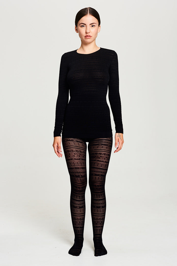 BIBI CHENITZ seamlesss Tattoo Tights. Tights has a Inuit tattoo inspired all-over pattern