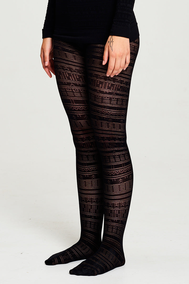 BIBI CHENITZ seamlesss Tattoo Tights. Tights has a Inuit tattoo inspired all-over pattern