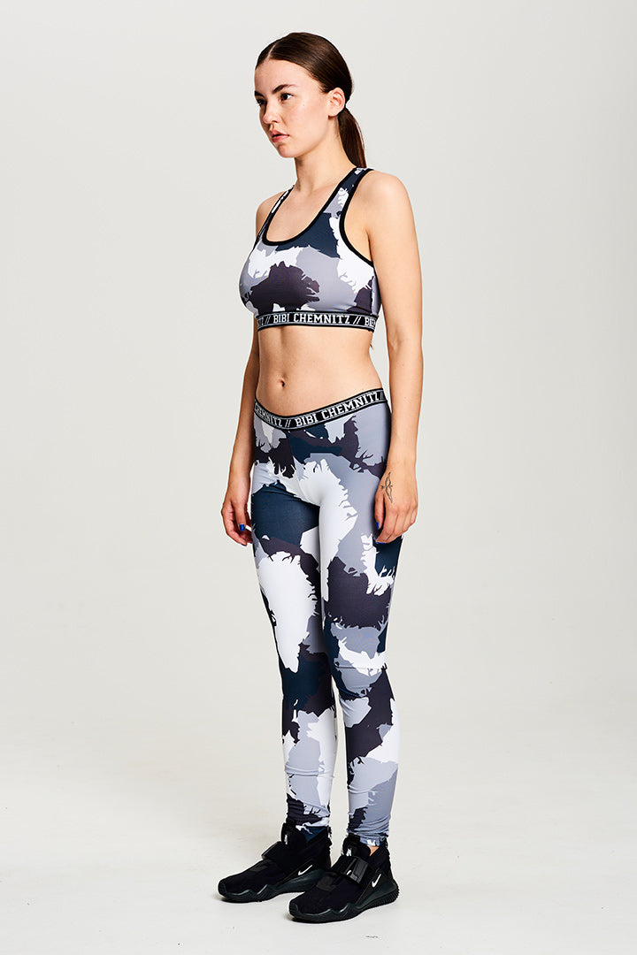 BIBI CHEMNITZ camo sports bra. Camo print is made from using the shape of Greenland. Fabric is stretchy.